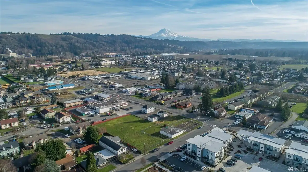 Aerial view of Sumner, Washington with Mount Rainier beyond the city