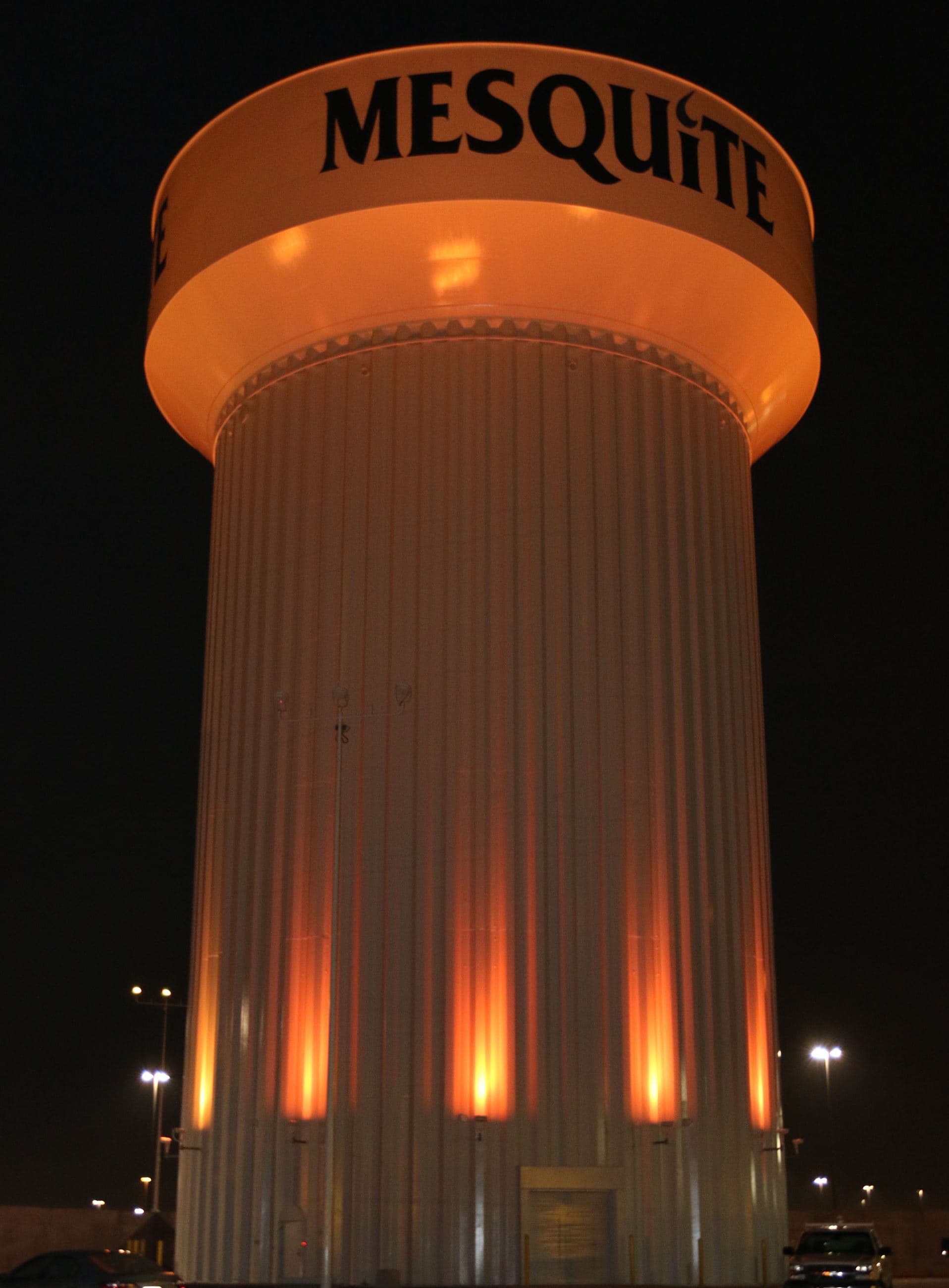 Mesquite water tower illuminated at night in Mesquite, Texas